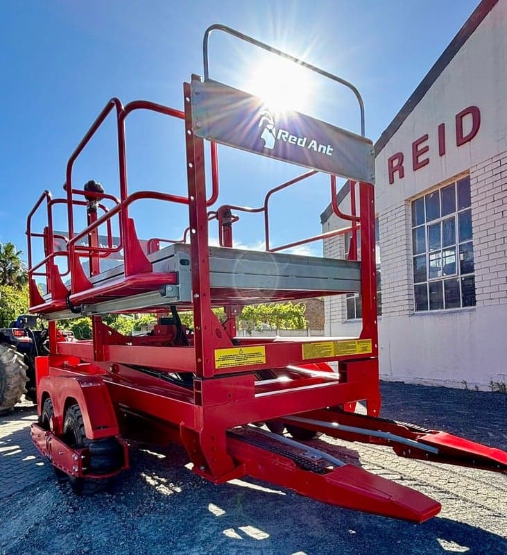Red Ant orchard platform raised outside the workshop